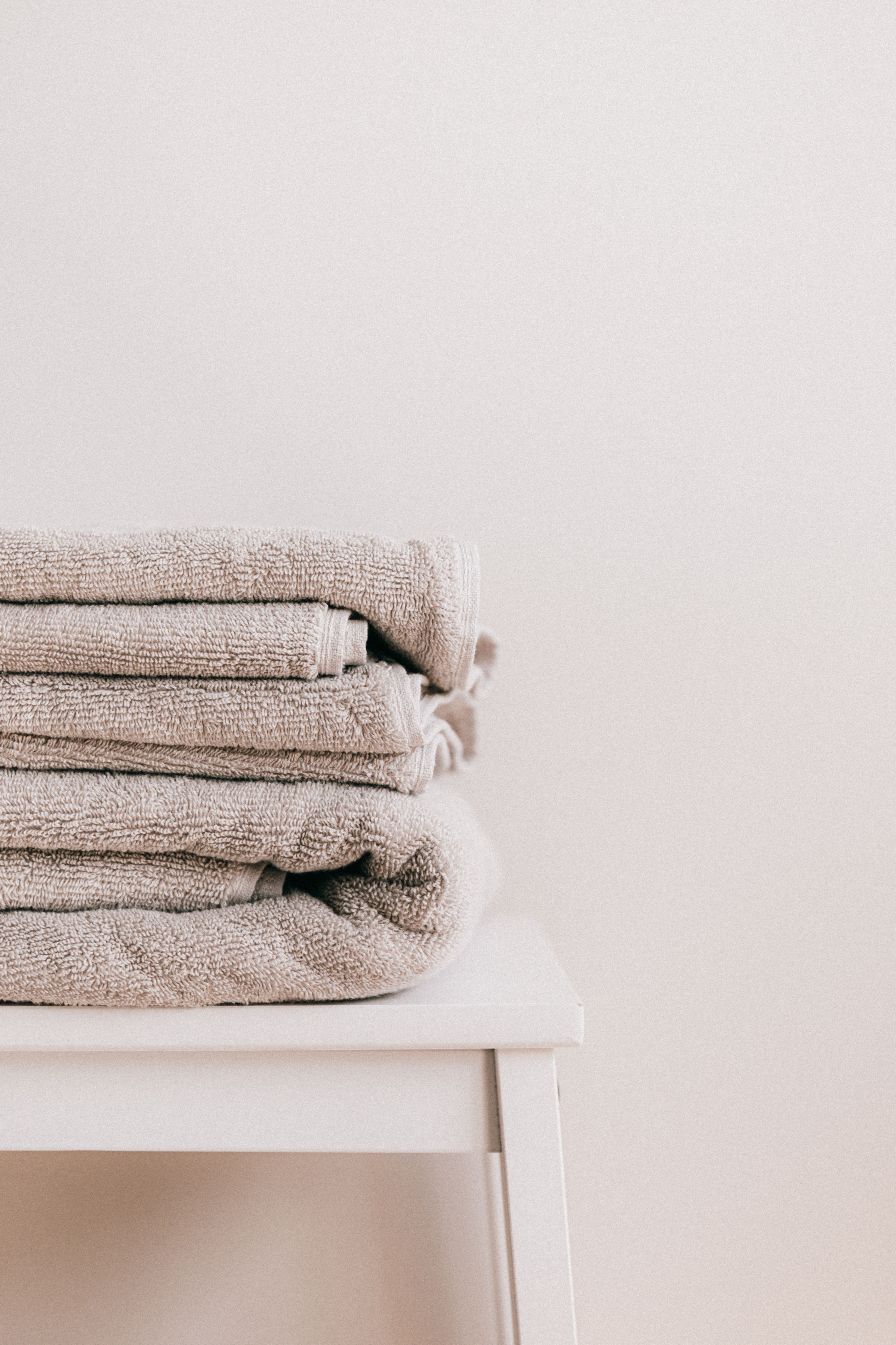 Wash, dry and fold laundry neatly stacked at Msafi Laundry Nairobi
